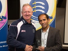 Minesh being presented outstanding contribution to coaching award by Middlesex head coach Richard Scott